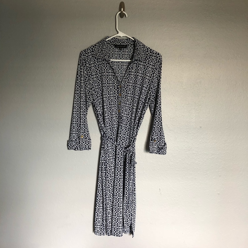 Navy blue and white patterned dress.